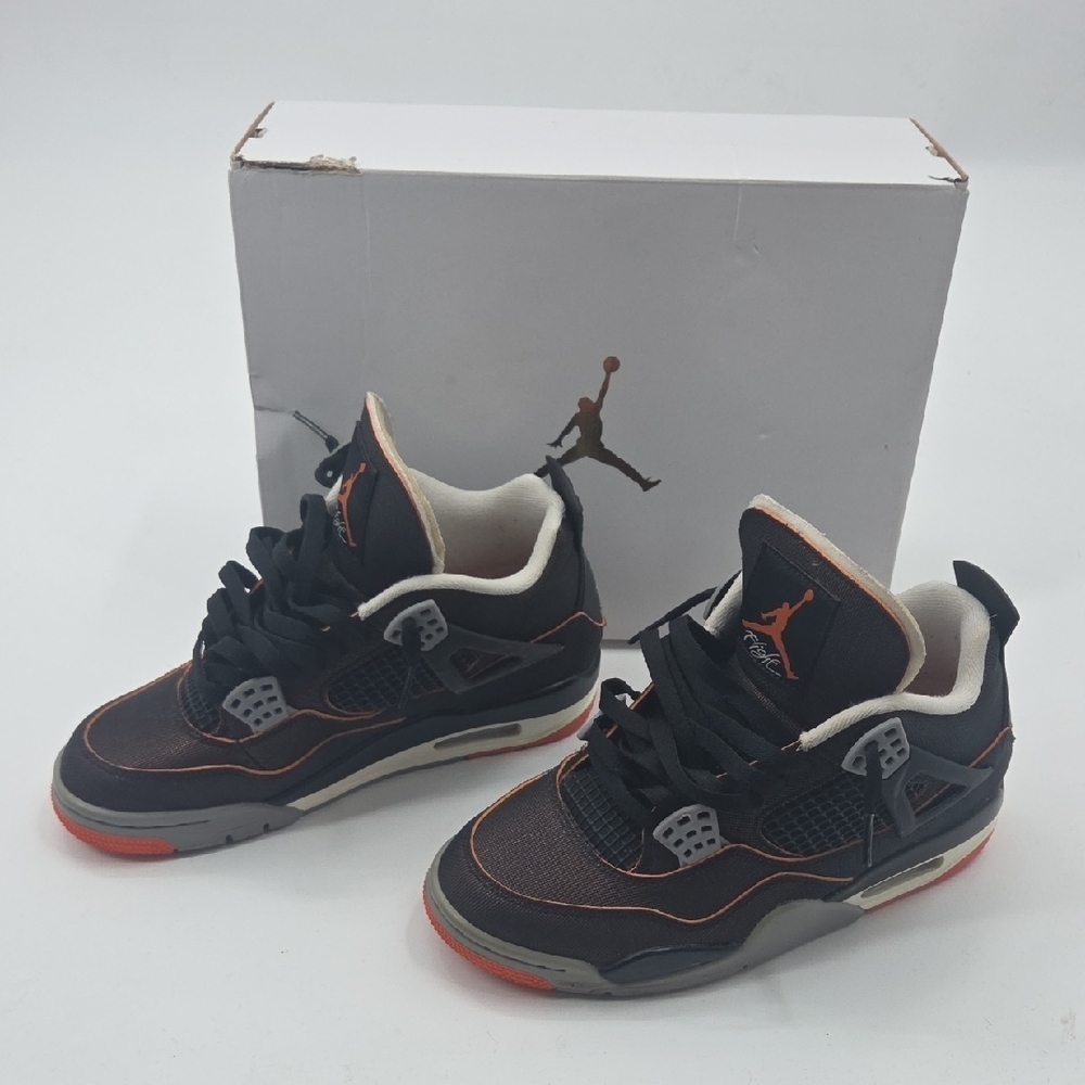 Jordan 4 Starfish Sneakers in Black and Orange